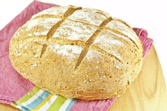 A round loaf of homemade Irish soda bread.
