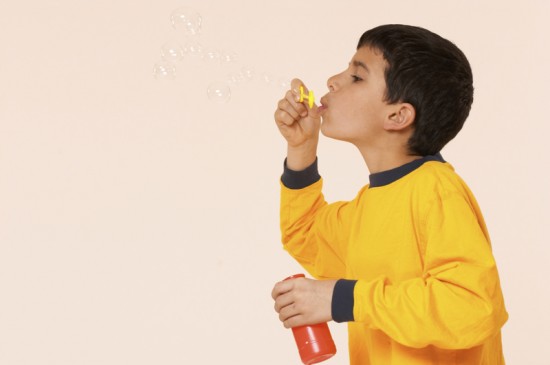 Boy Blowing Bubbles