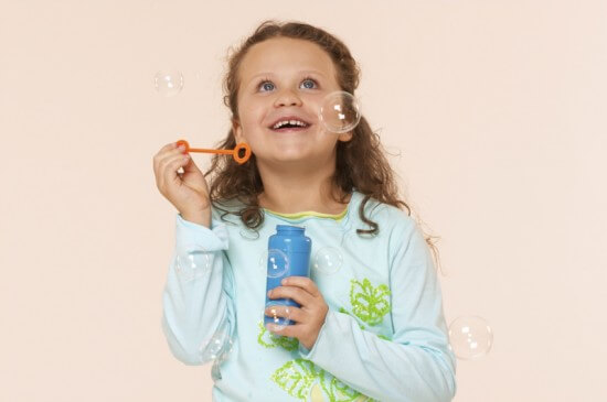 Girl Watching Bubbles