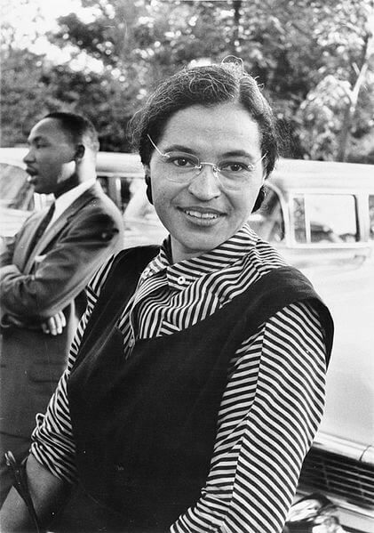 Rosa Parks with Martin Luther King, Jr. in the background.