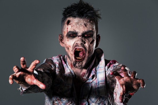 Aggressive, creepy zombie in clothes