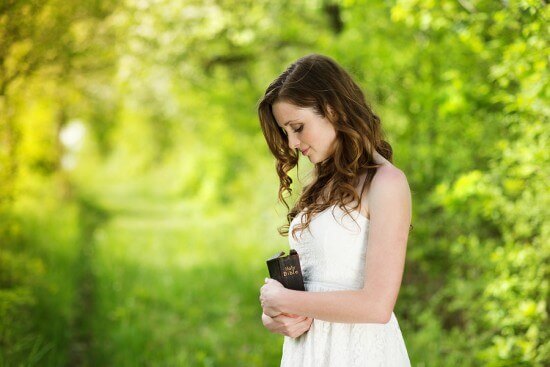 Beautiful woman with Bible