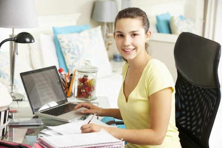 Teenage Girl Studying At Desk